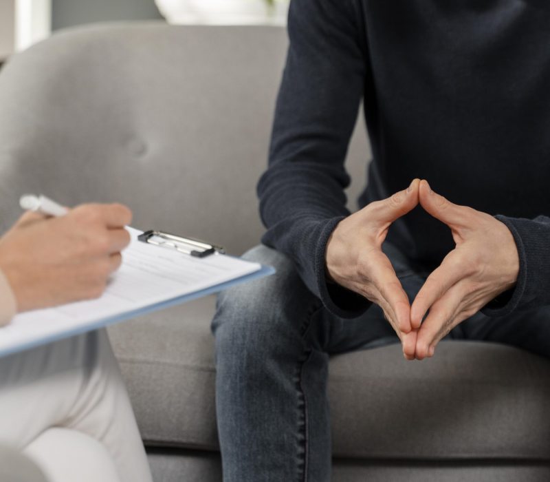 man-talking-to-therapist